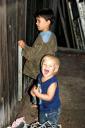  Seth and Ian playing behind the shed with Daddy’s tools. I love Ian’s expression! And what was Seth thinking? :-)