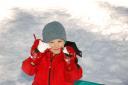  “Look, Mommy! I found snowballs!”