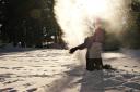  Darrell throwing snow into the sun.