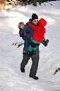  Snow is so difficult to walk in, especially for tired little boys. They have a kind Daddy!