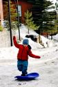  He wanted to stand on the sled and try to snowboard like Daddy!