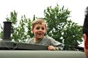  Jerome climbed up in a military truck first.