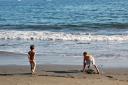  Seth seems to be sizing up the waves, and Jerome is diggin in!