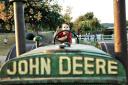  driving the John Deere