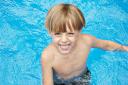  Finally happy in the pool! It was such a trial getting Jerome in this far on the first day, but after he knew he could walk in the shallow end he had a blast!