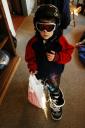  Seth trying on Jerome’s snow gear with Daddy’s boots. :-)