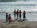  I loved watching all six children together! They took their food down to the waves.
